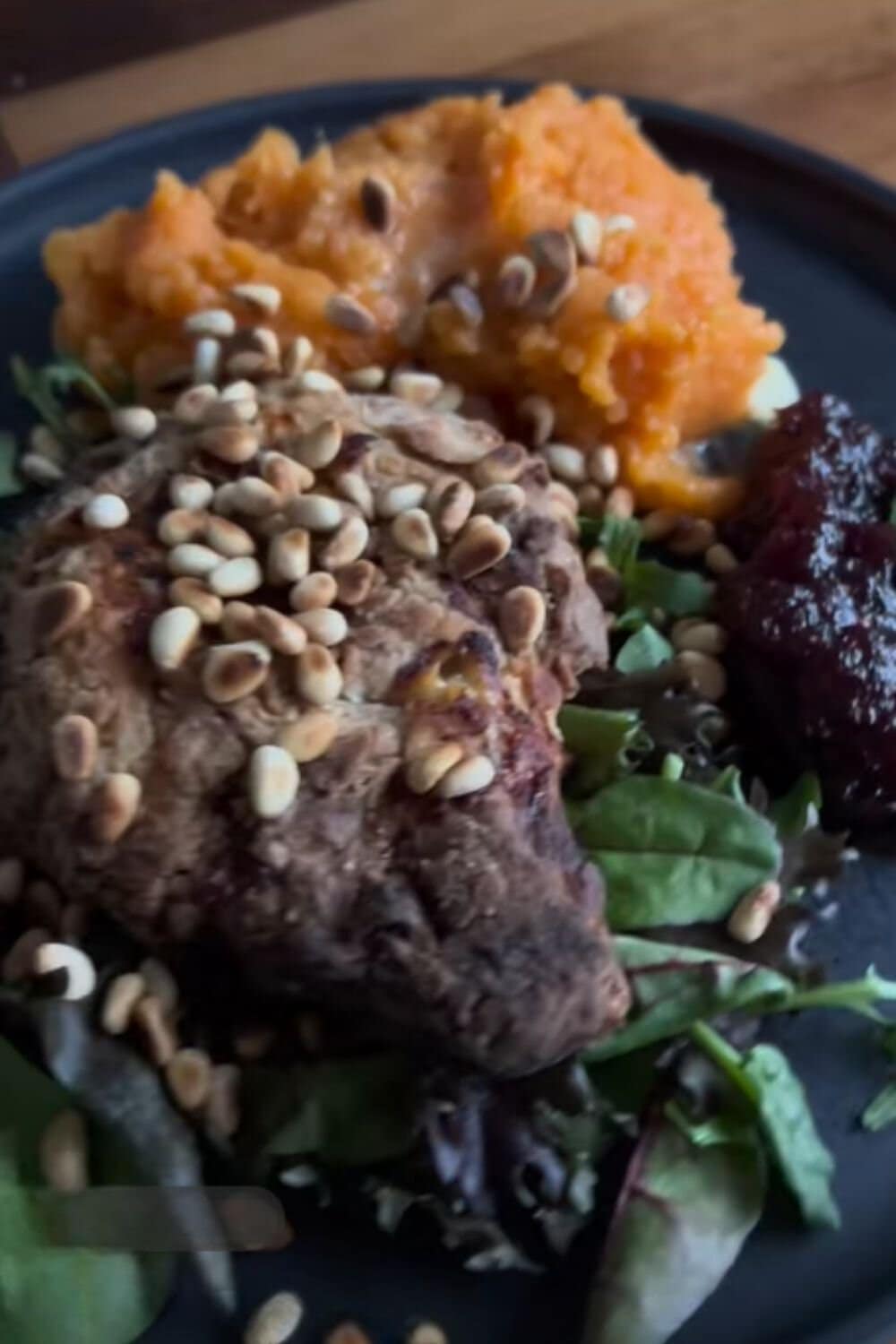 Ranch-seasoned pork chops served with sweet potatoes and greens, making a simple family dinner that fits into weight watchers recipes.