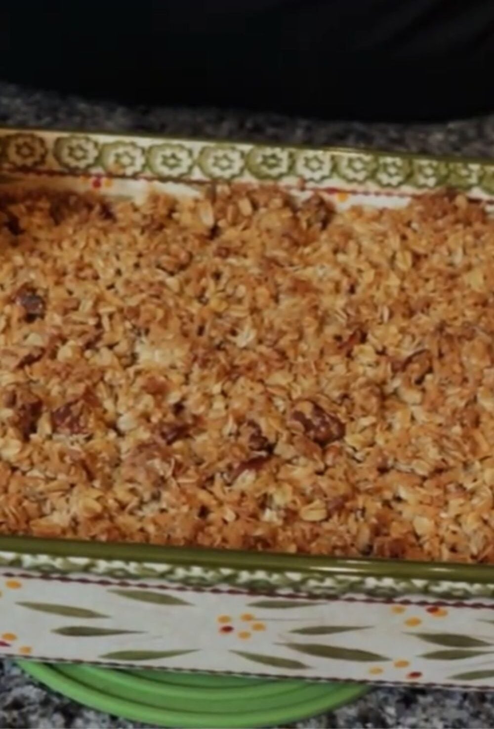 Apple cranberry crisp baked in a casserole dish with a golden oat topping, making a cozy dessert everyone recognizes.