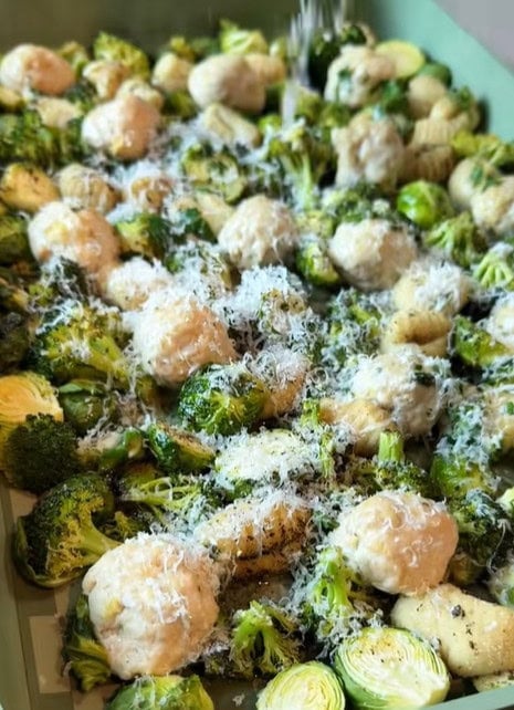 Chicken meatbals and broccoli on sheet pan
