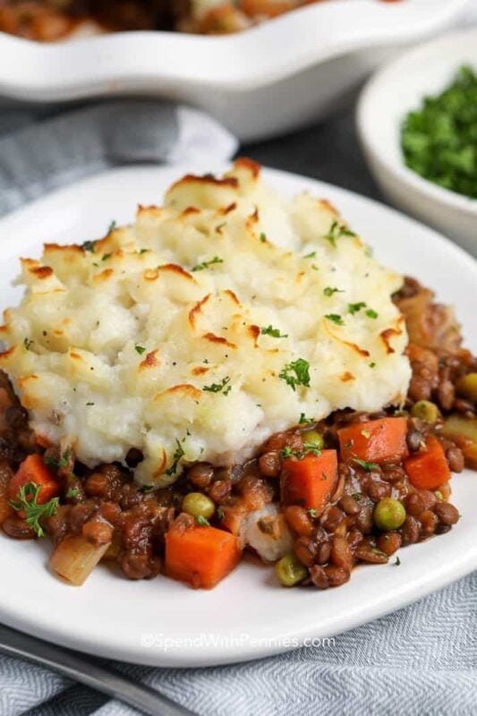 A cozy, plant-based shepherd's pie with a rich lentil filling and a fluffy mashed potato topping.