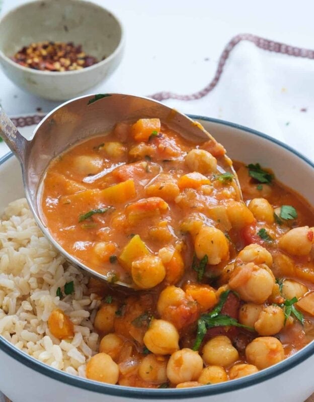 A hearty and comforting chickpea stew in a rich, spiced tomato broth, perfect for cold nights.