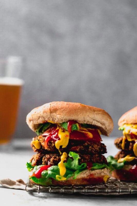 Hearty quinoa and black bean veggie burgers with a crispy exterior, perfect for grilling.