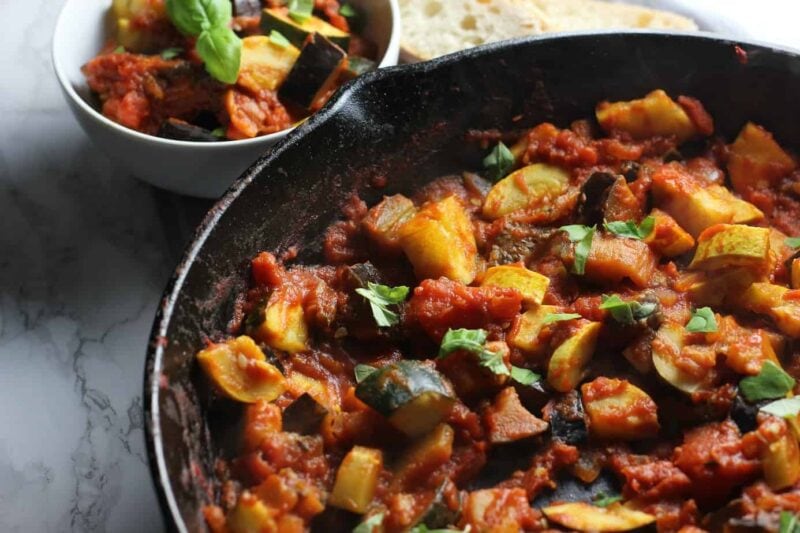 A colorful, classic French dish with zucchini, eggplant, and tomatoes in a rich sauce.