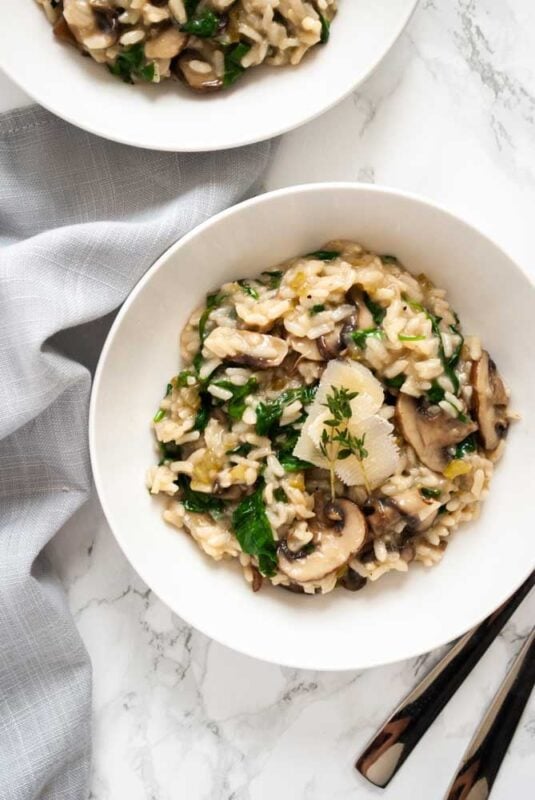 A creamy risotto with earthy mushrooms and fresh spinach for an indulgent meal.