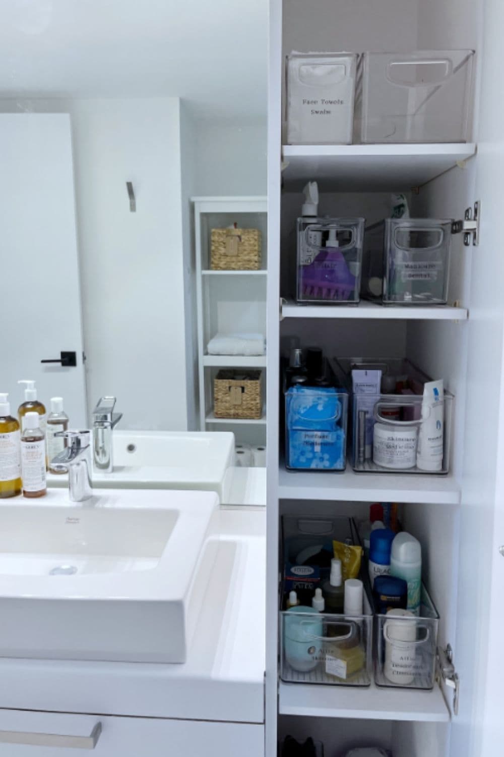 Bathroom cabinet with added shelf space using dollar store hacks to create extra storage without a full cabinet makeover.