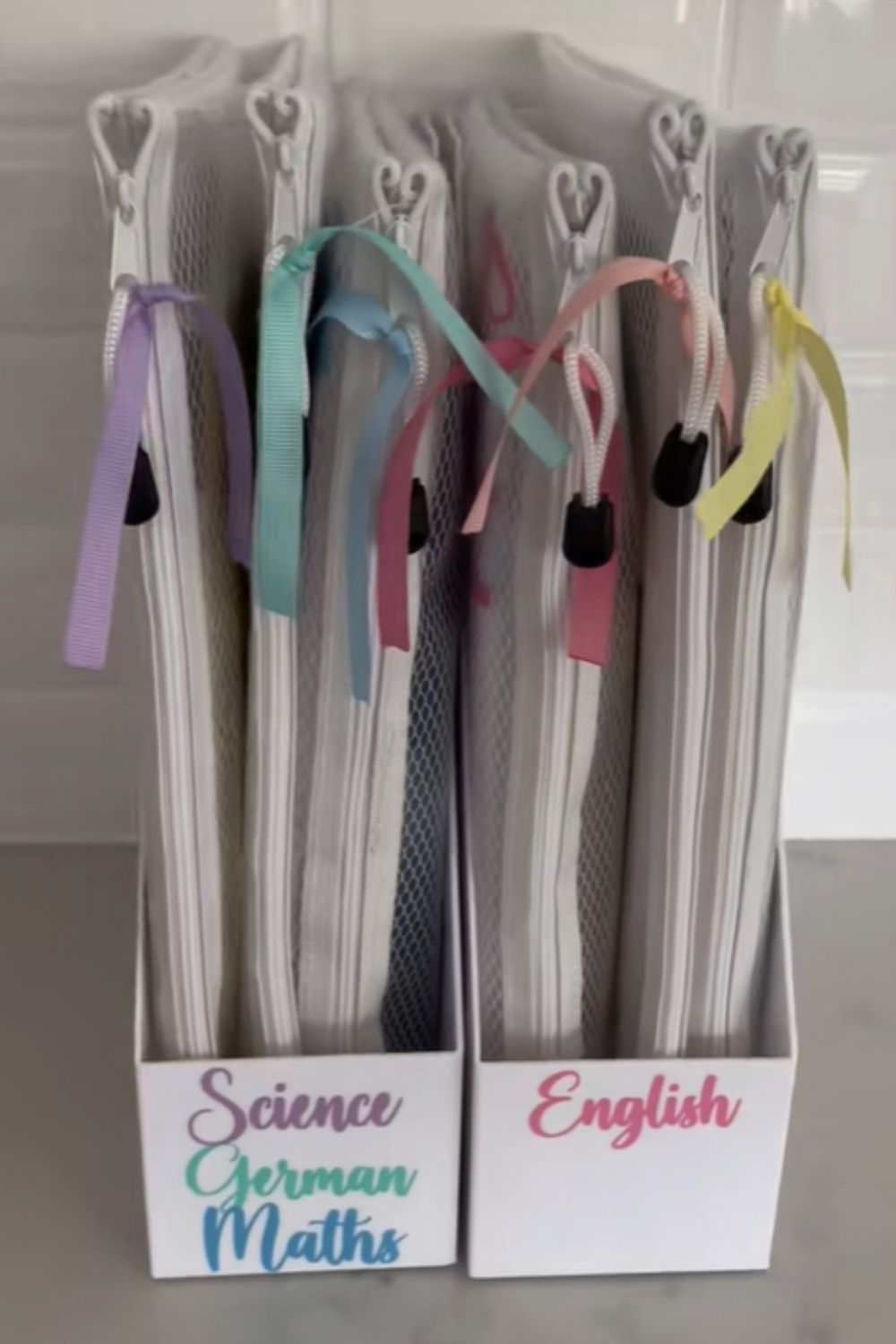 Magazine holders make great school paper holders. 