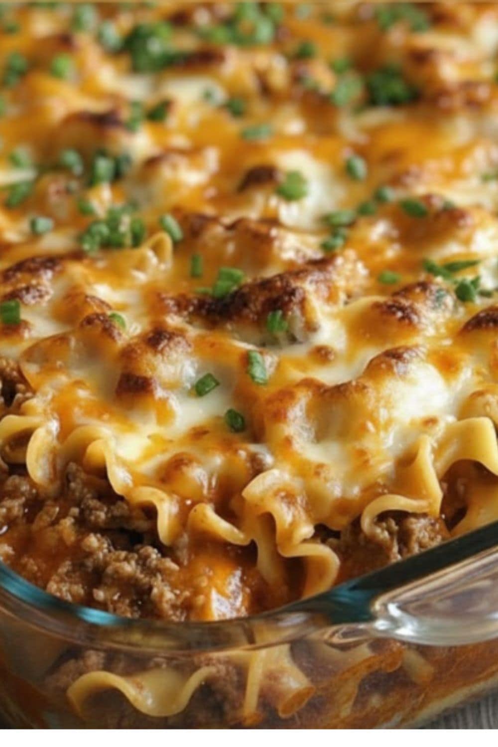 Creamy noodles, beef, and cheese baked together in a cozy casserole, a classic comfort pick from our dump and bake recipes list.