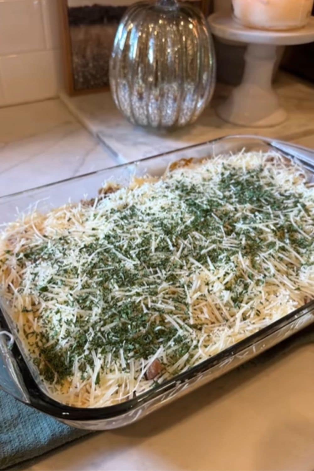 Cheesy manicotti layered in a baking dish and ready for the oven, one of those classic dump and bake recipes that feels like a real dinner win.