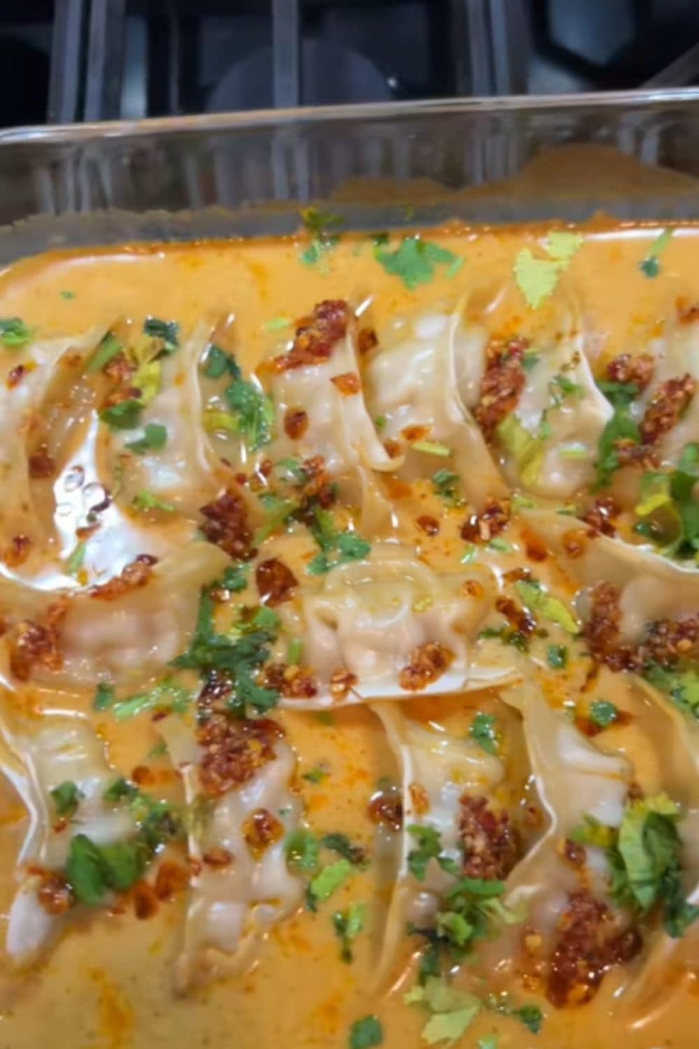 Trader Joe&rsquo;s dumplings baked in a creamy sauce with herbs, a fun twist on classic dump and bake recipes for dinner.